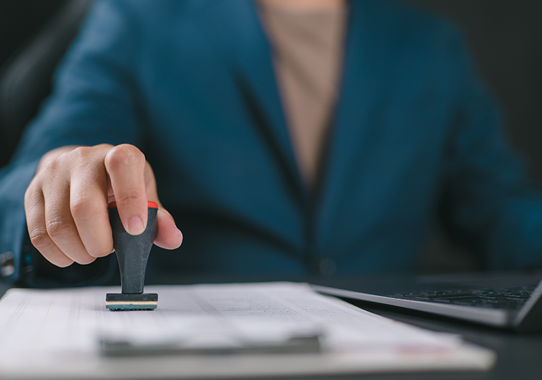 Businessman validates and manages business documents and agreements